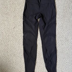 Lululemon Black High-Waisted Leggings with Cut-Out Mesh Design